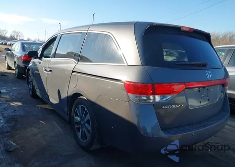 2014 Honda Odyssey Touring/Touring Elite z USA, uszkodzony, nr VIN 5FNRL5H9XEB003947